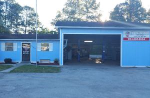 Norman Bros. Auto Repair jacksonville fl Mechanics Working on a Car in Jacksonville, FL