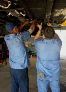Norman Bros. Auto Repair jacksonville fl Mechanics Working on a Car in Jacksonville, FL